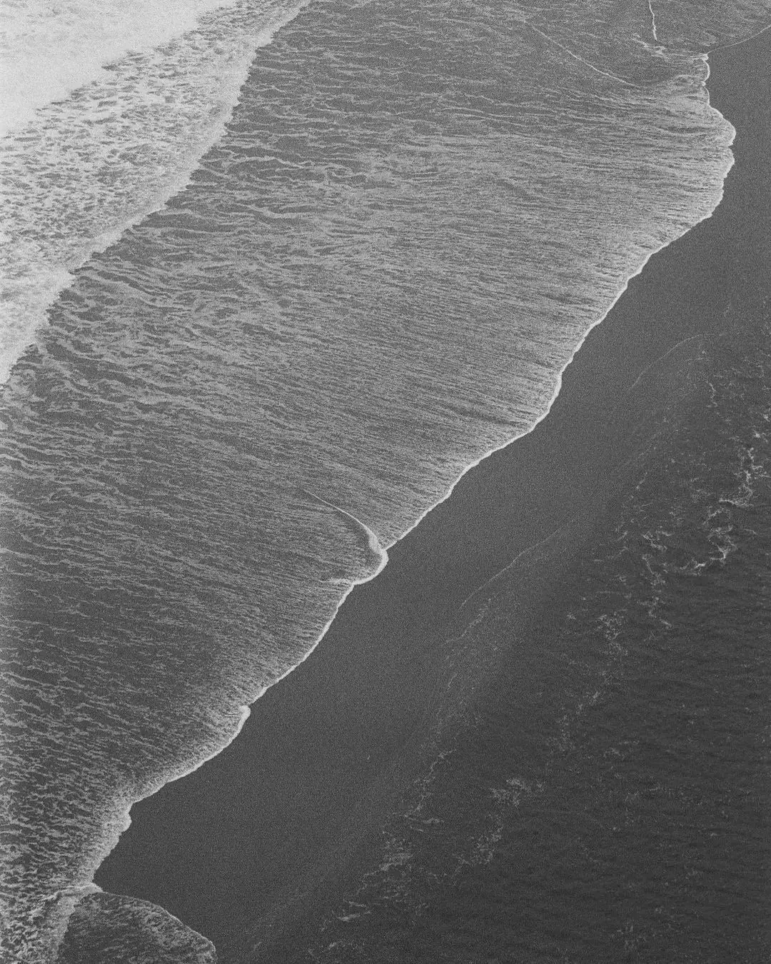 Shoreline from above, black and white film